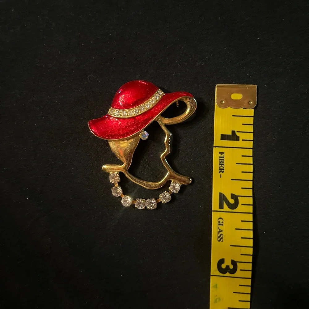 Vintage Unique Lady in Profile Brooch with Red enamel and dangling rhinestones